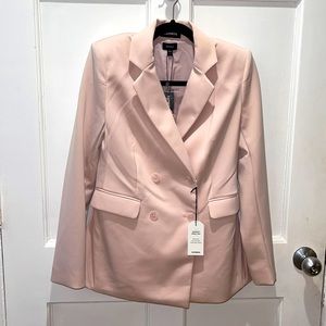 EXPRESS light pink supersoft blazer. Light padding on shoulders.